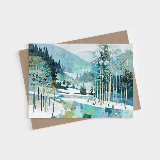 Watercolor-style greeting card featuring a serene winter forest scene with tall slender birch trees in the foreground, evergreens in the distance, and rolling hills in soft shades of blue, green, and white, evoking a peaceful snowy landscape.