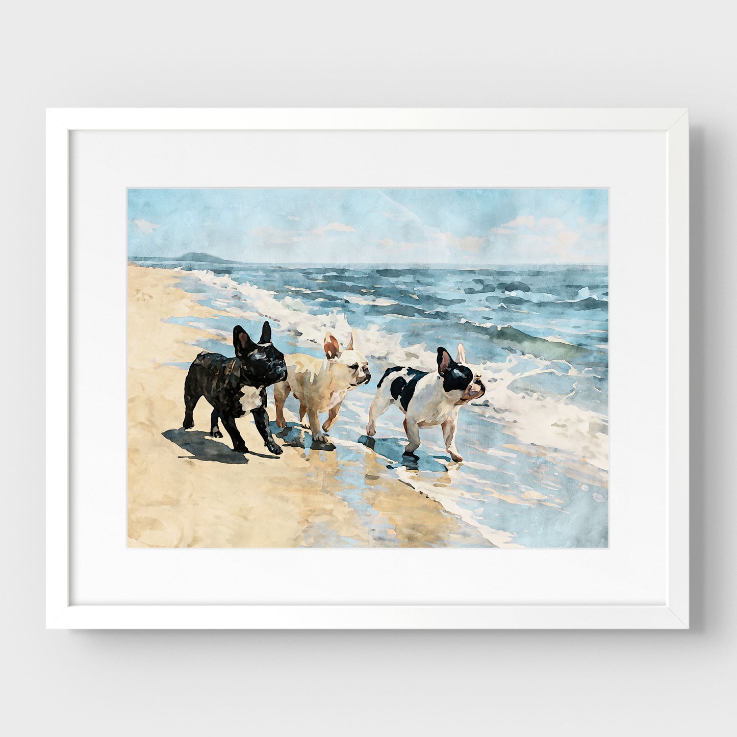 Matted white frame featuring three French Bulldogs on a beach in blue, tan, cream, black, and white tones.