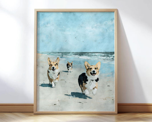 Framed painting of three corgis running joyfully on a sandy beach toward the viewer, with ocean waves and a bright blue sky in the background.