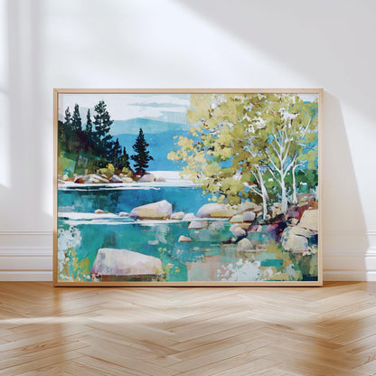 Framed painting of a serene lakeside scene, featuring turquoise water, large smooth rocks, and leafy green trees on the right with tall pine trees in the distance. The artwork has a modern impressionist style, blending bold brushstrokes and vibrant colors, and is displayed leaning against a white wall on a wooden floor.