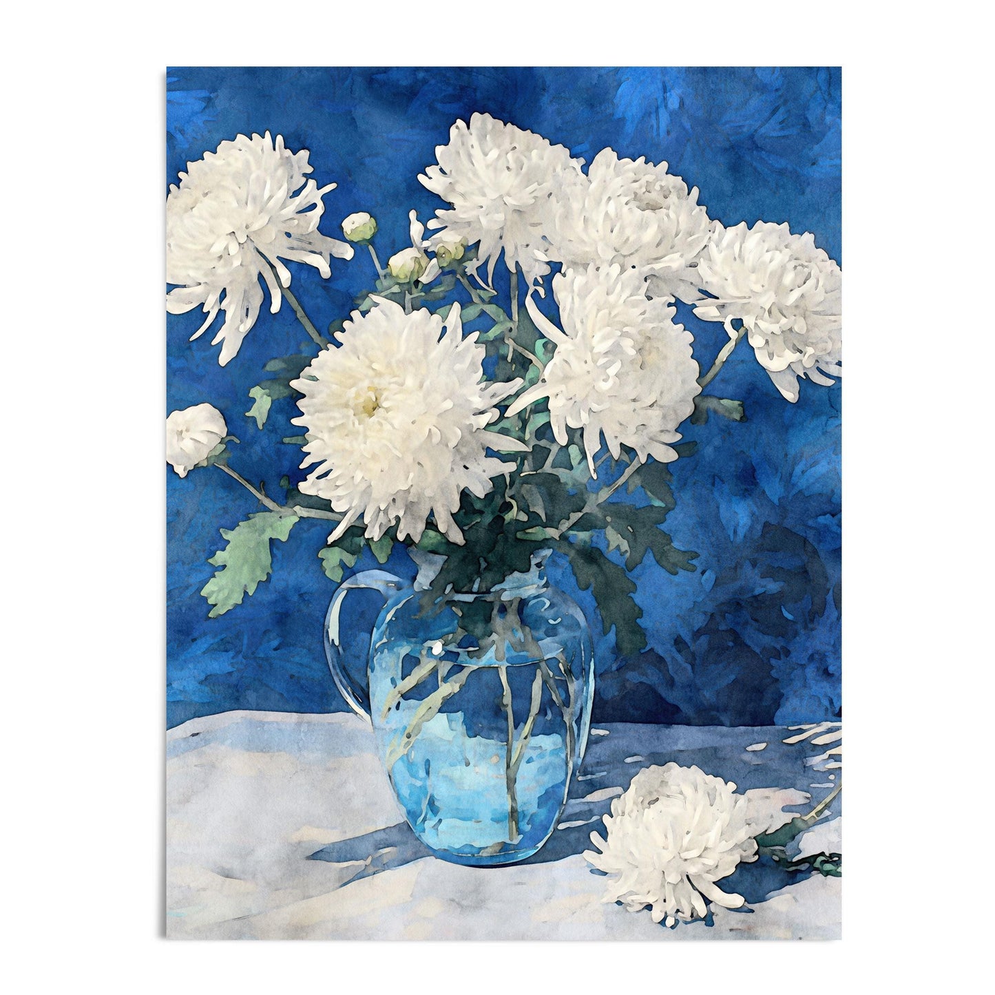 Watercolor-style art print of white chrysanthemums in a clear glass pitcher, set on a light cloth with a vivid blue background. One bloom rests on the surface beside the vase, adding balance to the serene floral still life composition.