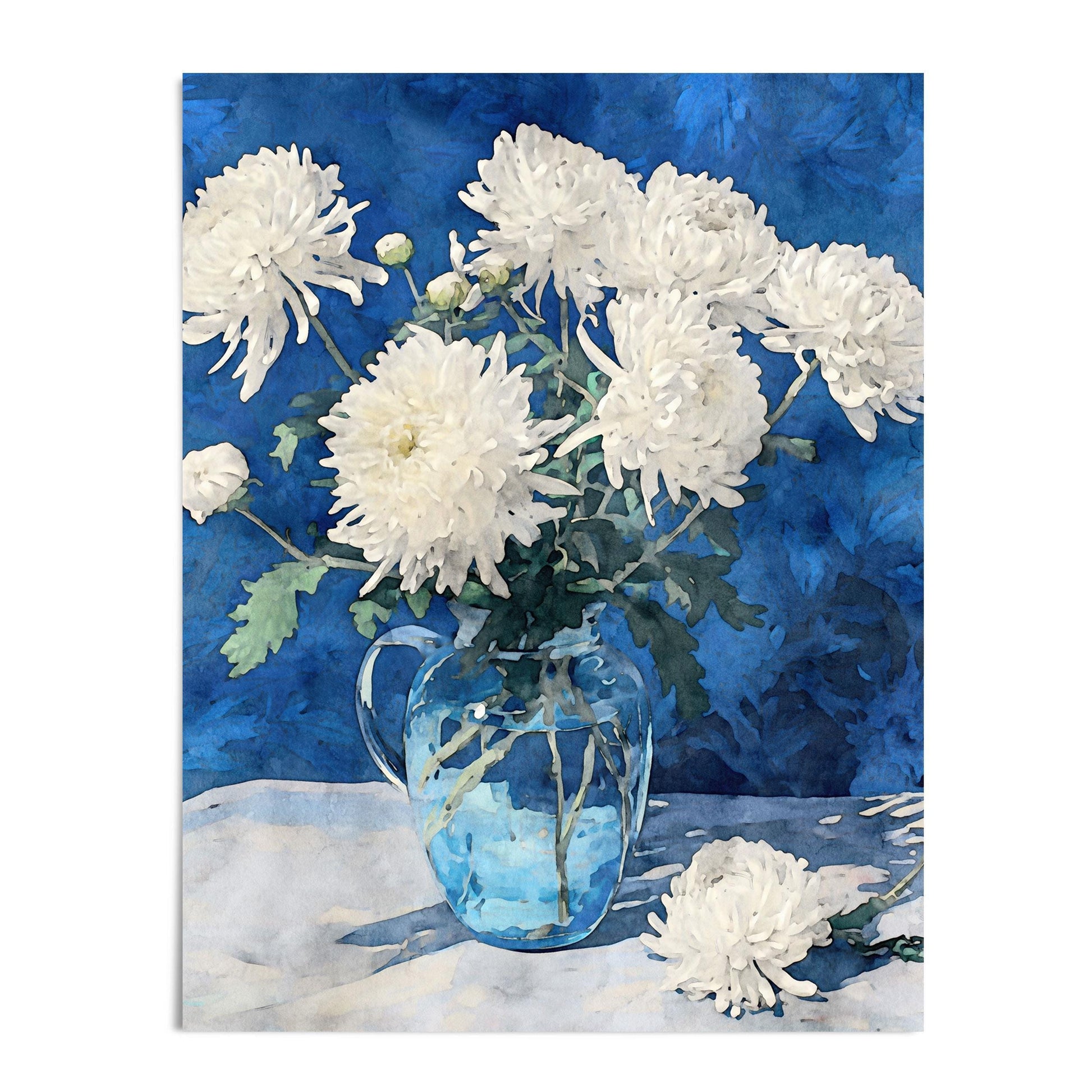 Watercolor-style art print of white chrysanthemums in a clear glass pitcher, set on a light cloth with a vivid blue background. One bloom rests on the surface beside the vase, adding balance to the serene floral still life composition.
