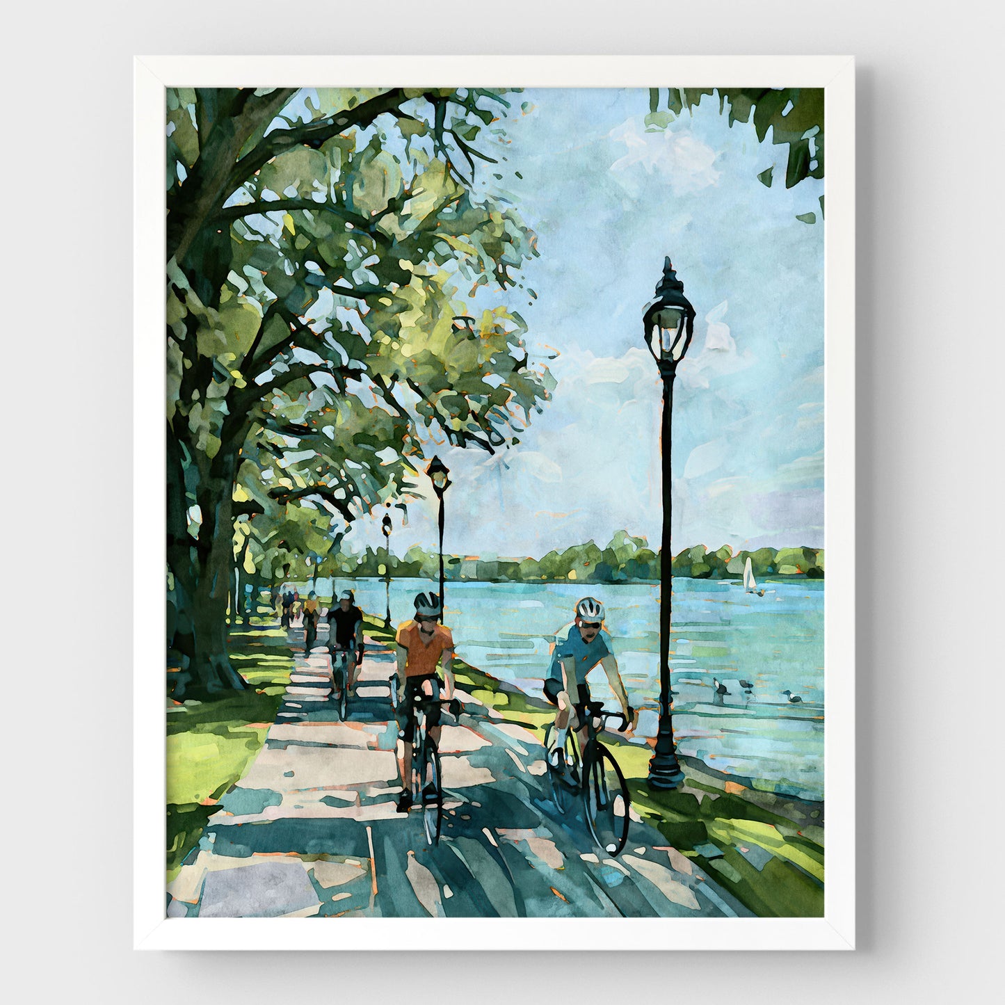 Minneapolis lake cyclist art print in a white frame.
