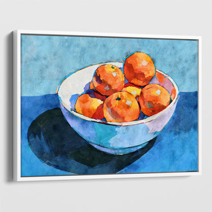 Bowl of oranges still life canvas in a white float frame with citrus oranges, white bowl, and blue background.