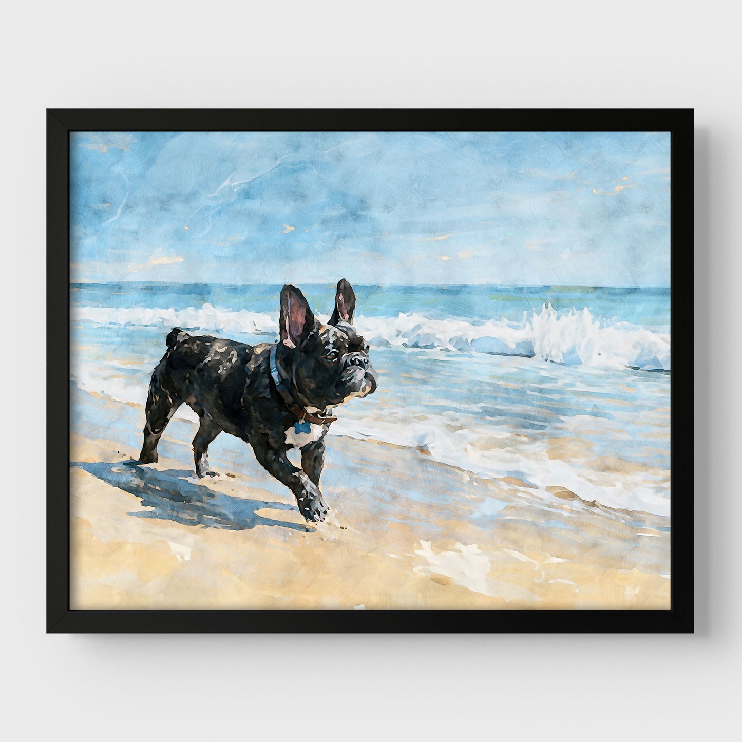 Brindle French Bulldog beach watercolor art print with blue waves and tan sand displayed in a black frame.