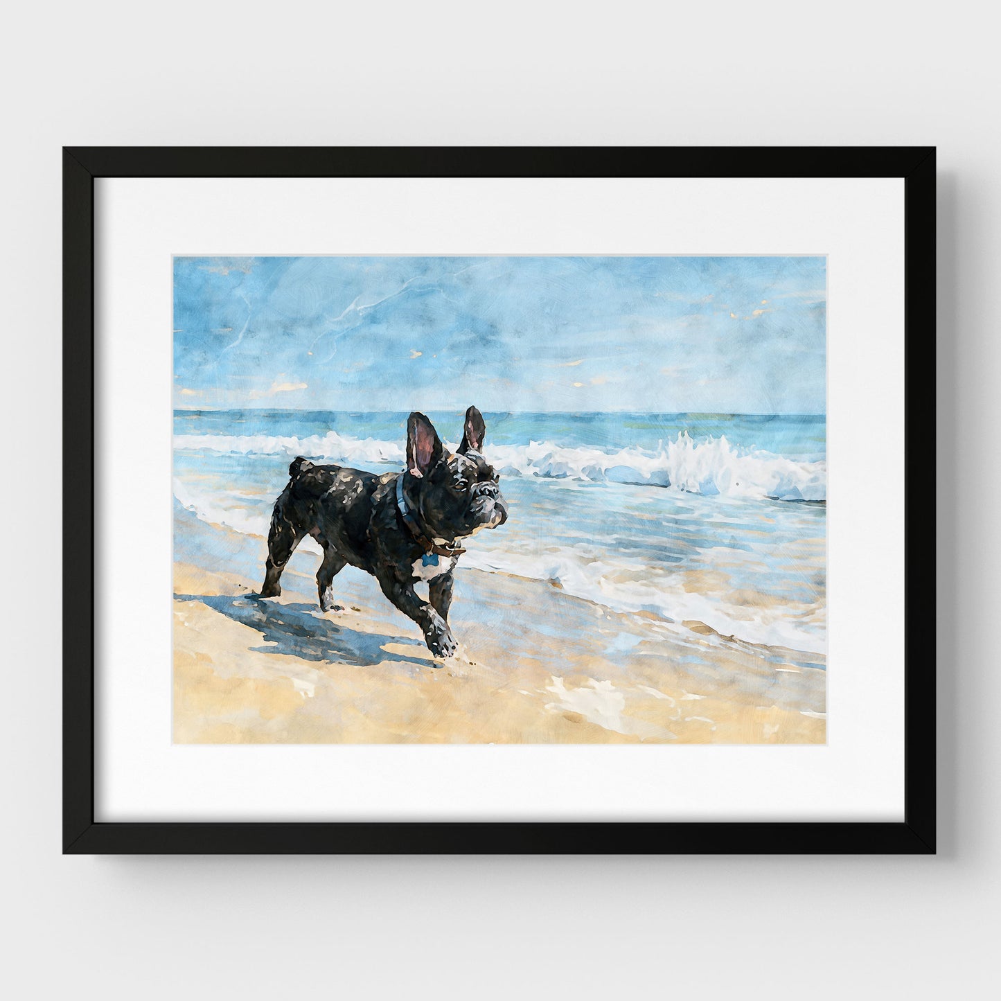 Matted brindle French Bulldog beach art print in a black frame, featuring blue ocean waves and tan sand.