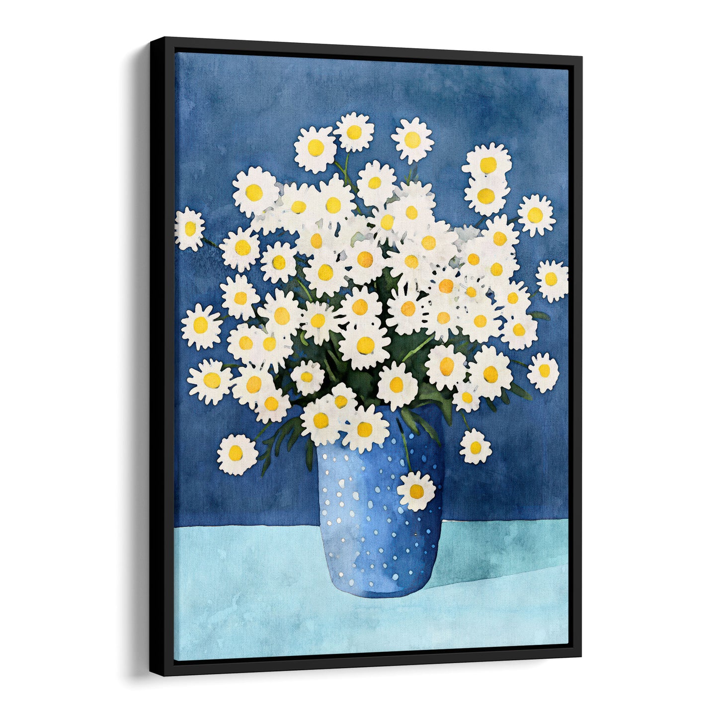 Canvas artwork with a black frame, featuring a watercolor-style depiction of white chamomile flowers with yellow centers arranged in a blue polka-dotted vase, set against a deep blue background and a light blue surface.