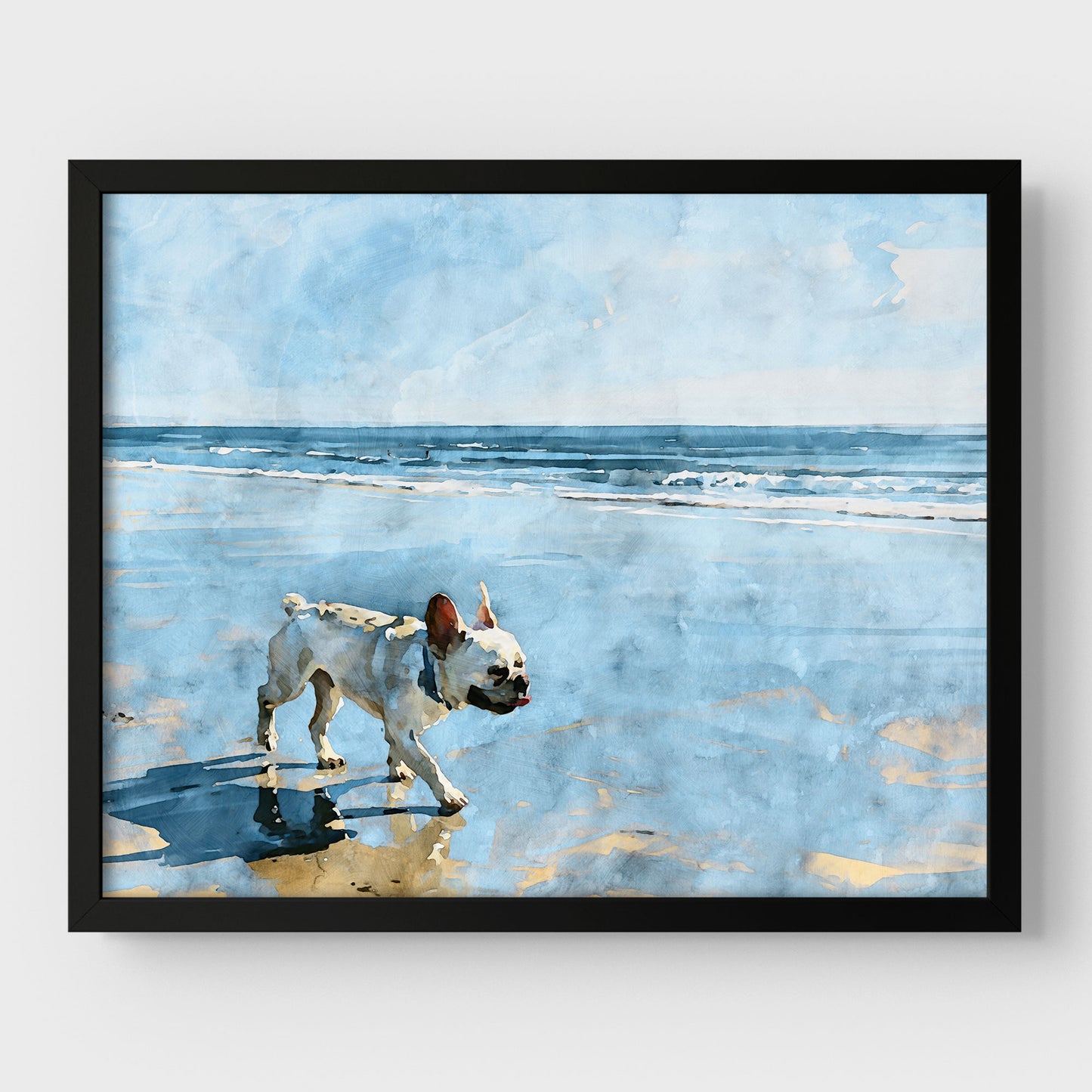 Cream French Bulldog beach watercolor art print with blue ocean and sandy shore shown in a black frame.