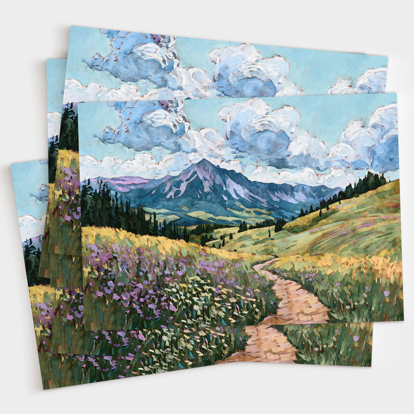 Two postcards with a scenic landscape featuring mountains, fields, and a blue sky.