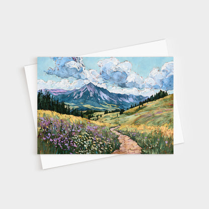 Greeting card with a mountain landscape and path on a white background