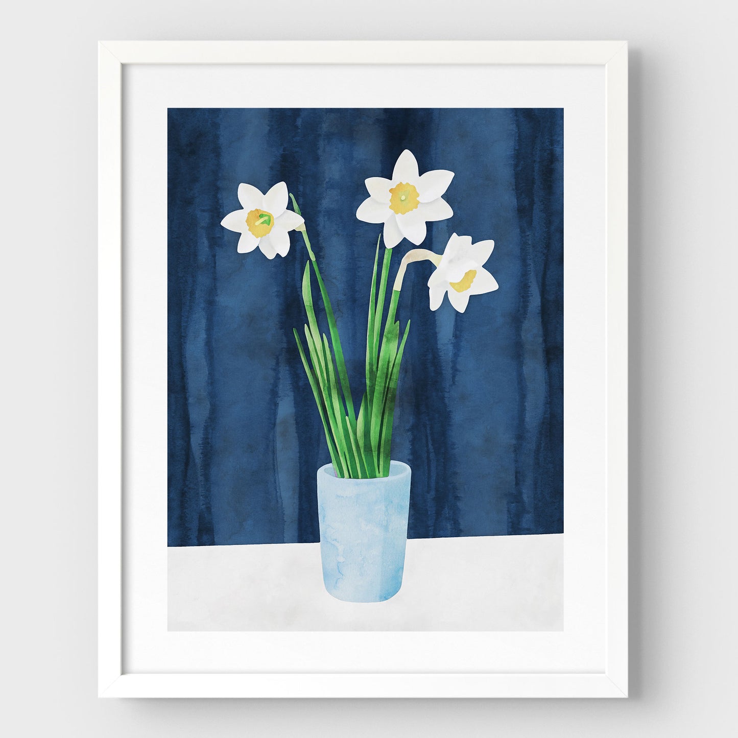 Artwork with a white frame and white border, featuring a watercolor-style depiction of three white daffodils with yellow centers in a light blue vase, set against a deep blue textured background.