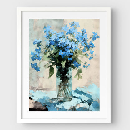 Framed watercolor painting of blue forget-me-not flowers in a clear glass vase, sitting on a blue cloth. The artwork is surrounded by a white border and encased in a sleek white frame, enhancing its elegant and impressionist style.