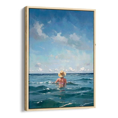 Painting of a woman wearing a straw hat and swimsuit, standing waist-deep in the ocean under a blue sky with scattered clouds. Artwork printed on gallery wrap canvas in natural wood floater frame.