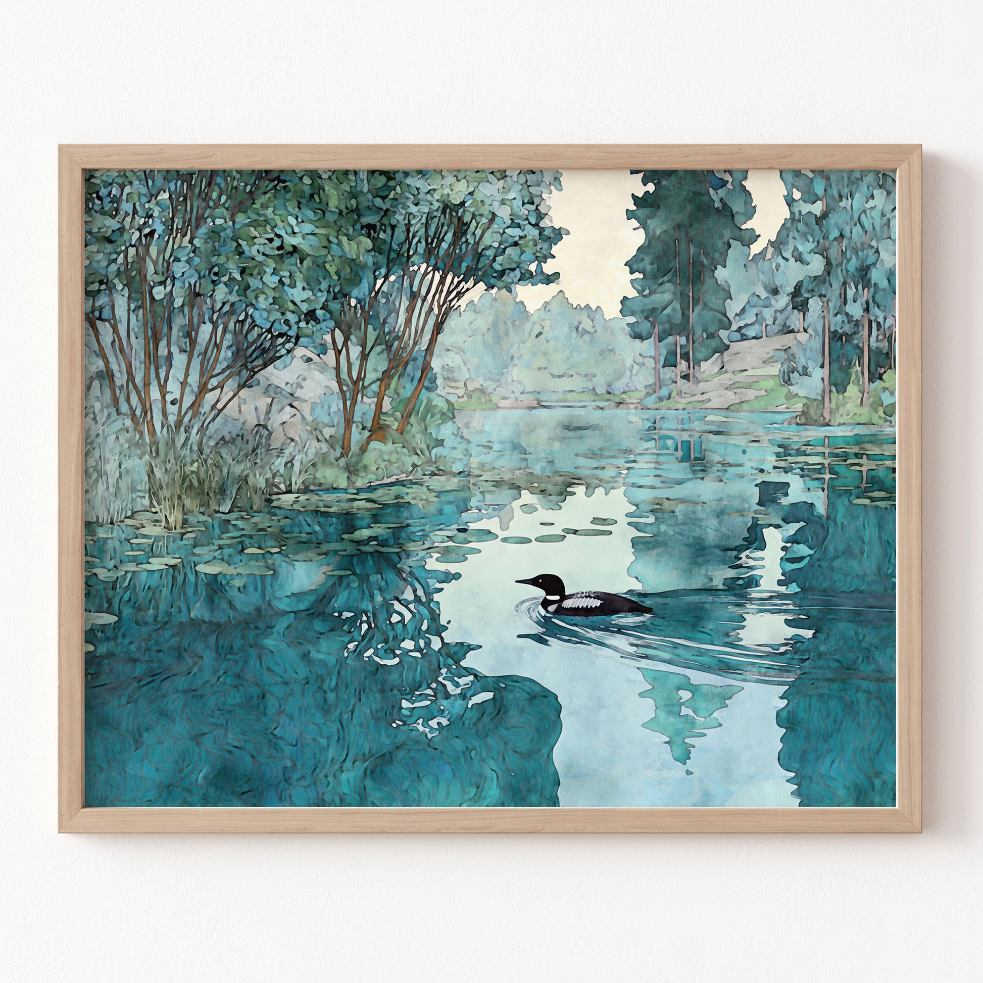 Framed artwork of a loon on a lake with trees