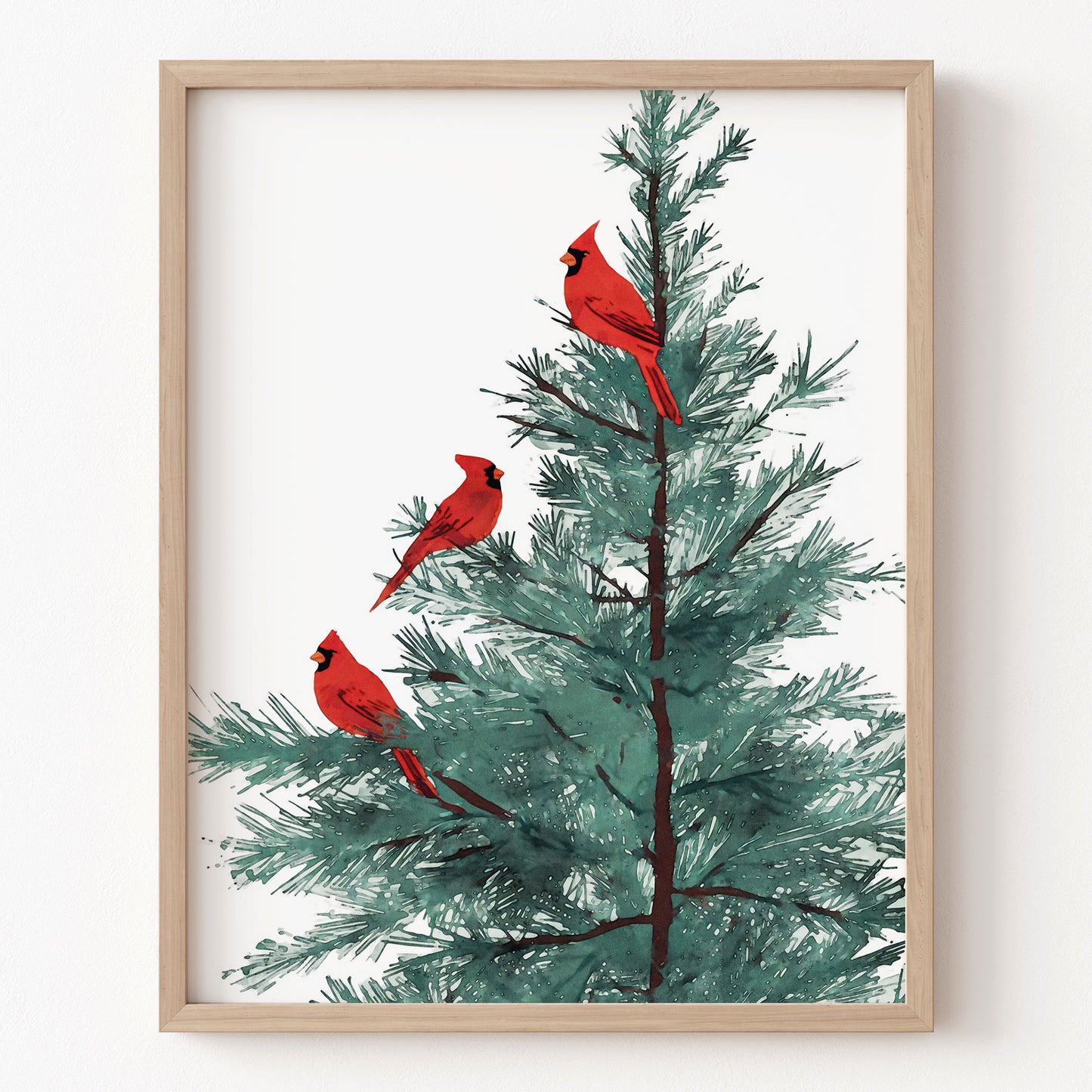 Framed artwork of three red cardinals on a tree with a wooden frame.