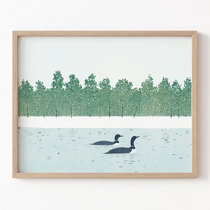 Framed artwork of two loons on a lake with a forest in the background