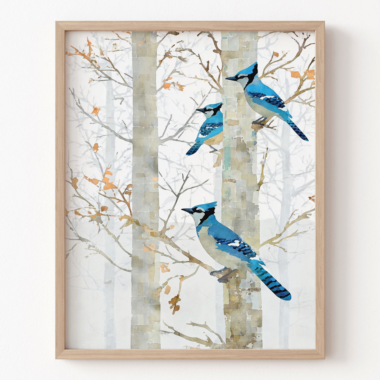 Framed artwork of blue jays on a winter tree branch with a neutral background