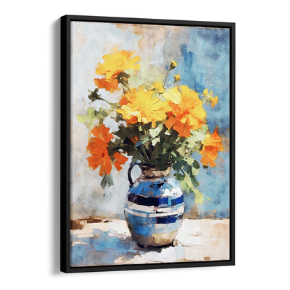 Black framed canvas artwork featuring a watercolor-style depiction of a bouquet of vibrant orange and yellow marigold flowers arranged in a blue ceramic vase, set against a soft blue background.
