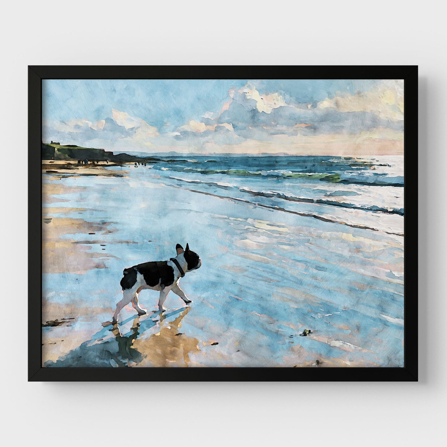Pied French Bulldog beach watercolor art print with blue ocean waves and sandy shore displayed in a black frame.