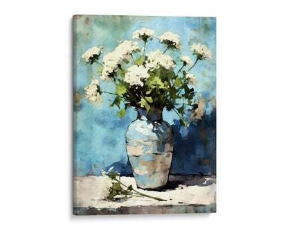 Canvas print of a watercolor painting depicting white Queen Anne's Lace flowers in a blue striped vase against a vibrant blue background with beige accents.