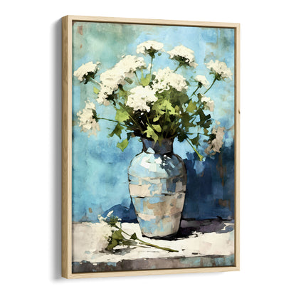 Framed watercolor painting of Queen Anne's Lace flowers arranged in a blue and white ceramic vase. The delicate white blooms and green stems stand against a rich blue background, with a modern natural wood frame complementing the impressionist-style artwork.