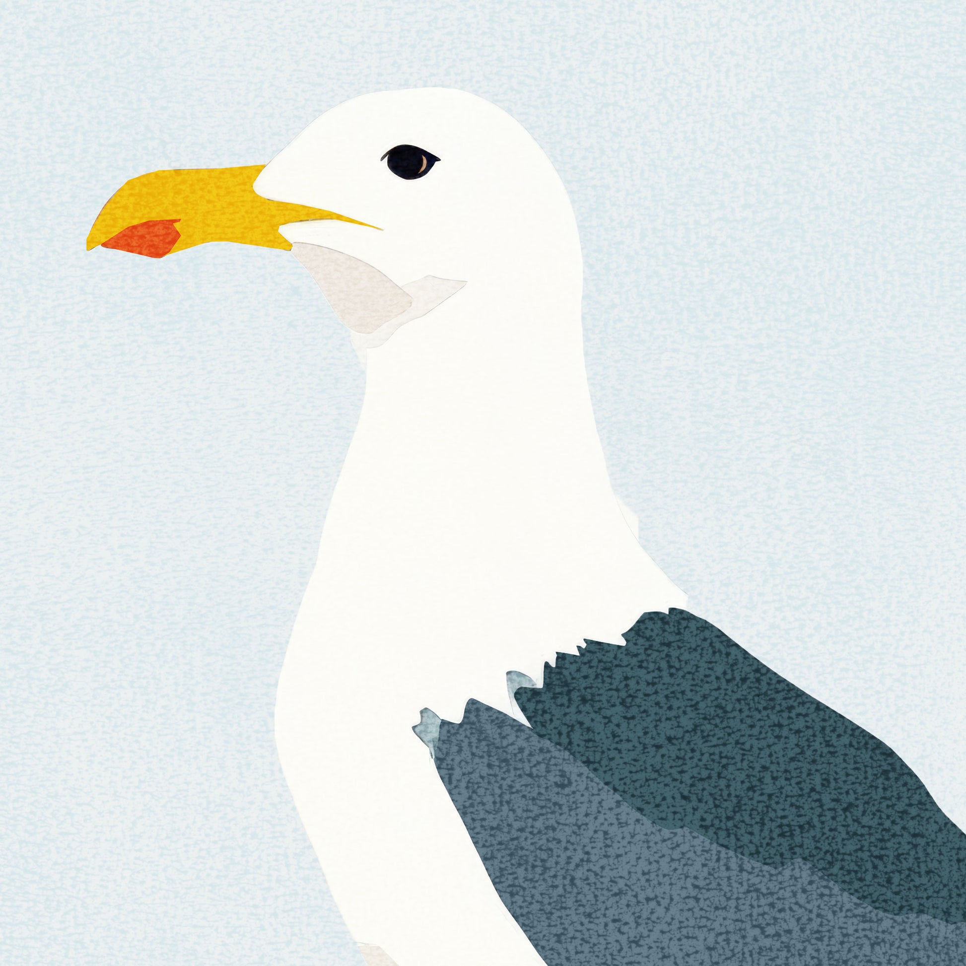 Detail of a minimalist greeting card standing upright, featuring a seagull with dark wings and white head perched on textured blue rocks beneath a pale sky.