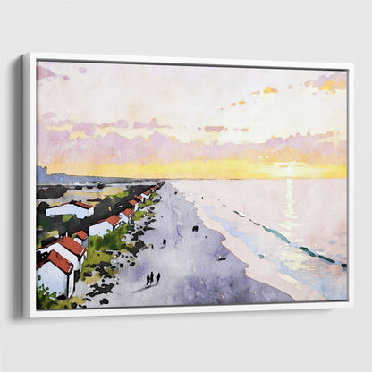 Framed canvas print in white, showcasing a watercolor-style depiction of a serene beach at sunrise, with soft pastel skies, a reflective ocean, and a row of houses along the coastline.