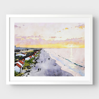 Framed artwork in white, showcasing a watercolor-style beach scene at sunrise, featuring pastel skies, a reflective ocean, and a row of houses along the shoreline.