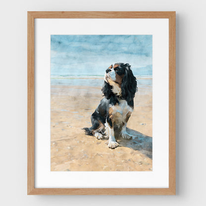 Framed artwork of a tricolor Cavalier King Charles spaniel on a beach with an oak wood frame.