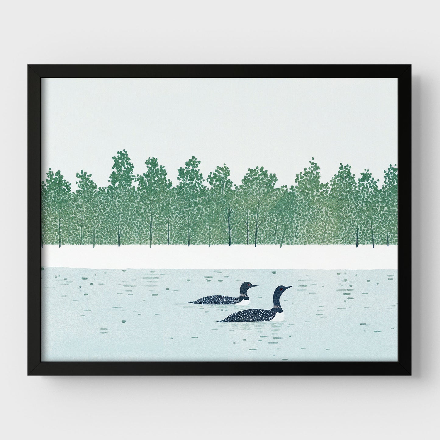 Framed artwork of two loons on water with a forest in the background