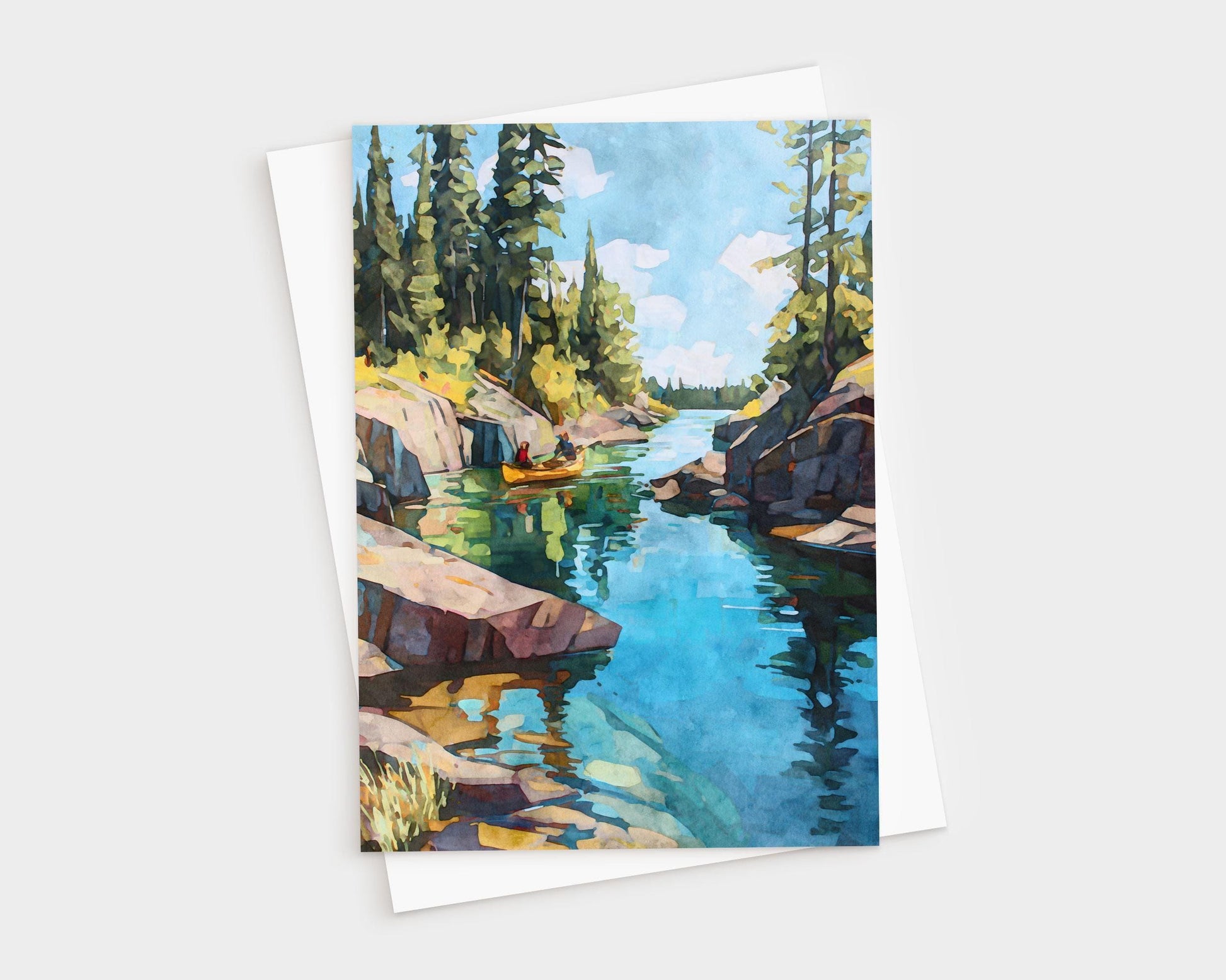 Watercolor greeting card depicting a narrow lake channel with tall pines and rocky cliffs. A golden canoe floats on the calm turquoise water, which reflects the sky and trees. The scene captures a peaceful wilderness atmosphere.